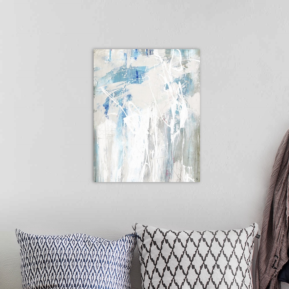 A bohemian room featuring Large abstract painting in shades of blue, beige, gray, and white.