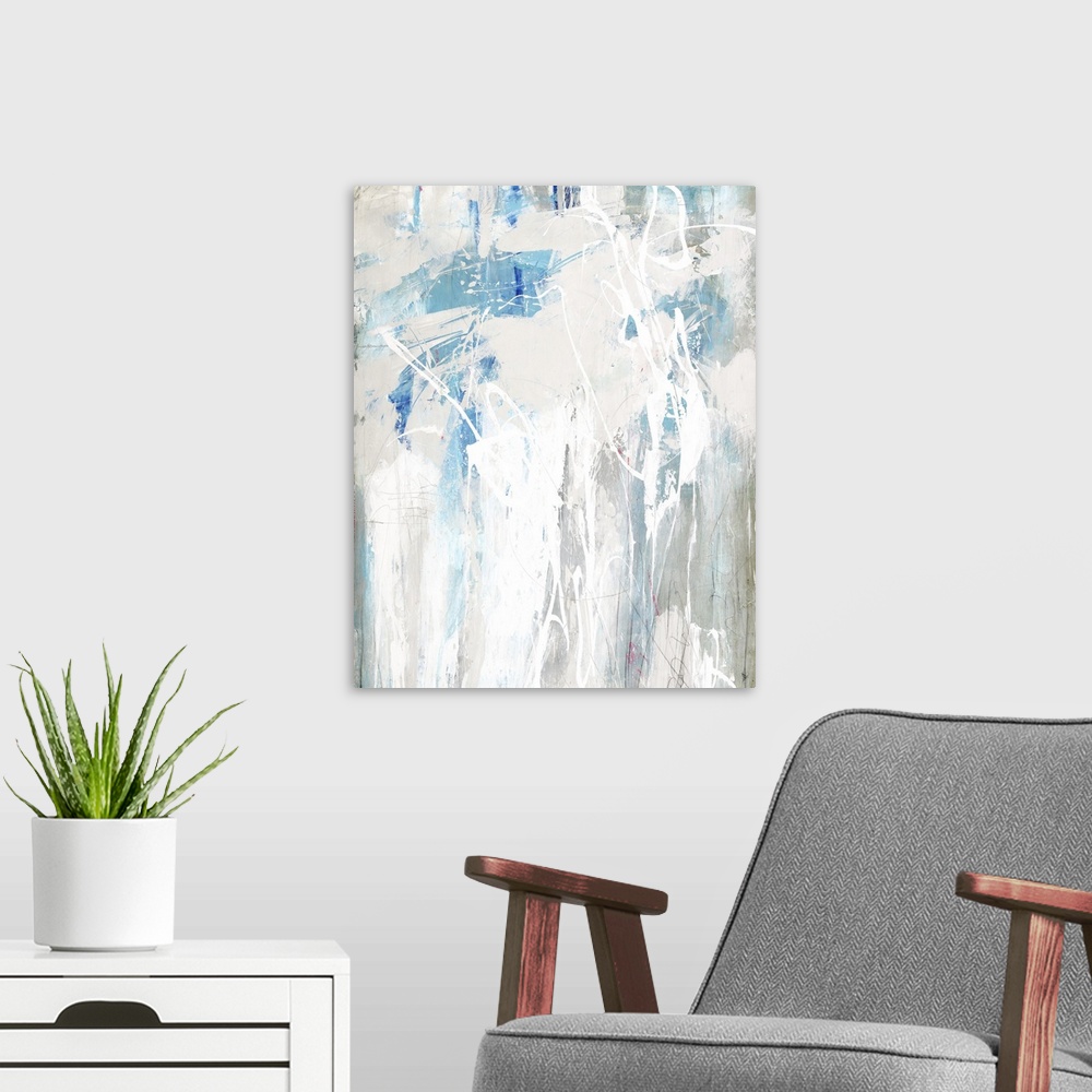 A modern room featuring Large abstract painting in shades of blue, beige, gray, and white.