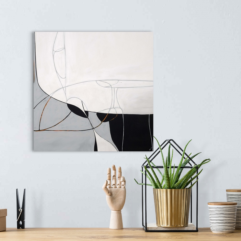 A bohemian room featuring Contemporary abstract artwork in black, white, and grey, with curving lines.