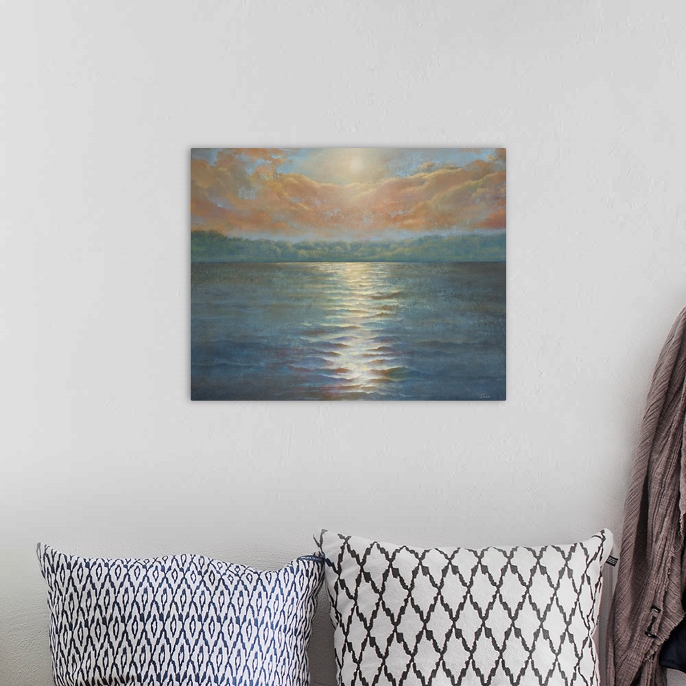 A bohemian room featuring Contemporary painting of a sun setting over a body of water.