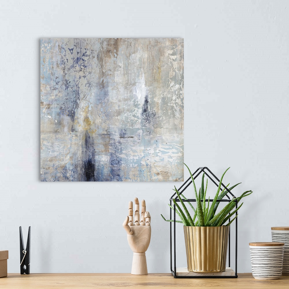 A bohemian room featuring Contemporary abstract artwork in cool shades of blue and grey.