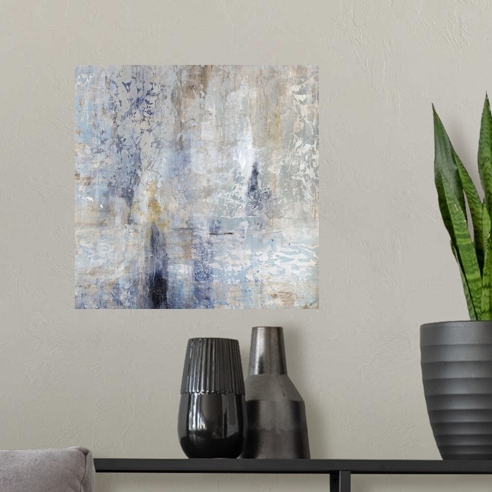 A modern room featuring Contemporary abstract artwork in cool shades of blue and grey.
