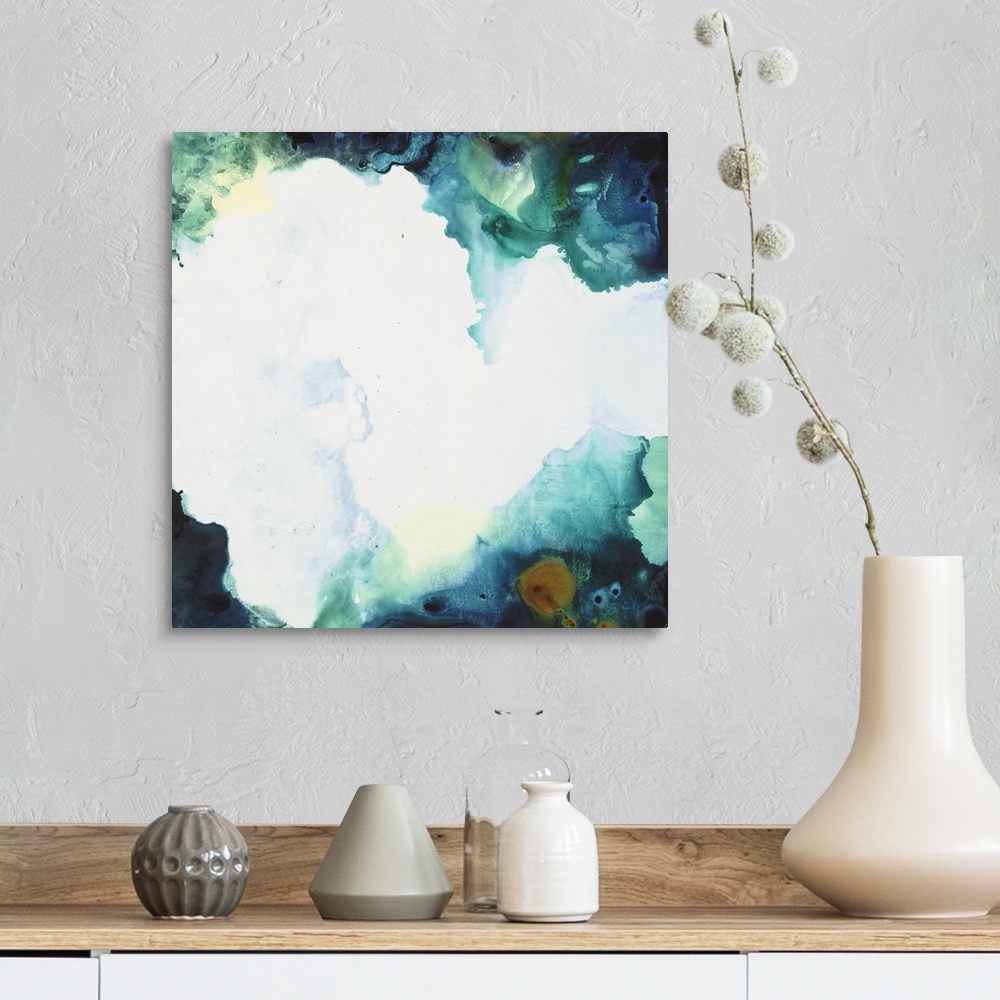 A farmhouse room featuring Square abstract art with a bright white splotch in the center and colors forming together around ...