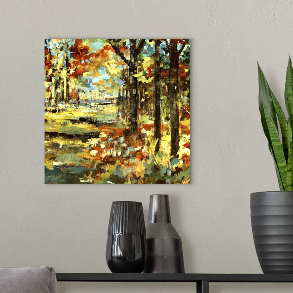 A modern room featuring Square painting of a fall landscape made up of fat and short brushstrokes of color.