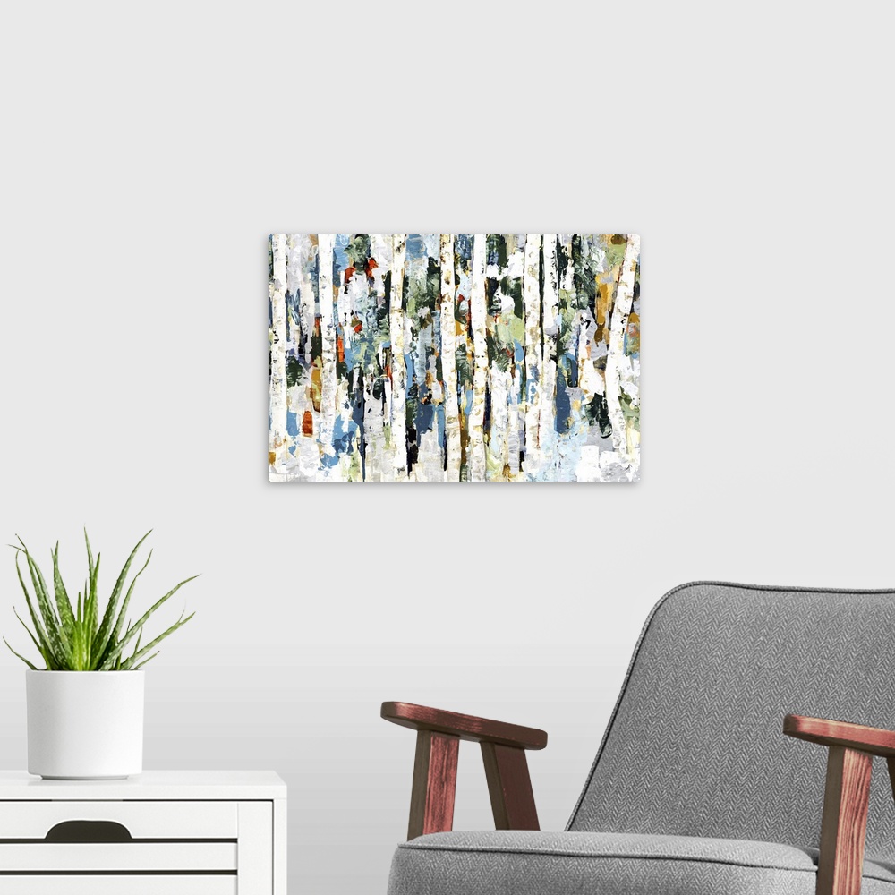 A modern room featuring Abstract painting of a wooded forest of colorful leaves.
