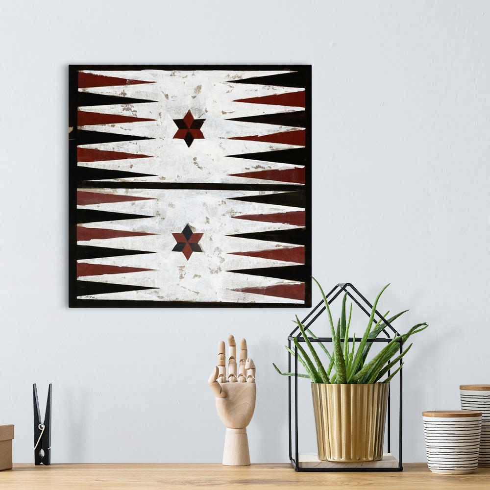 A bohemian room featuring Painting of a rustic looking backgammon board surrounded by a black border.