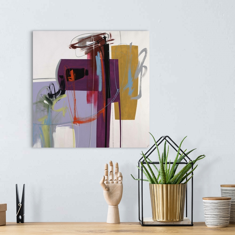 A bohemian room featuring Abstract painting using vibrant colors in different different shapes against a neutral background.
