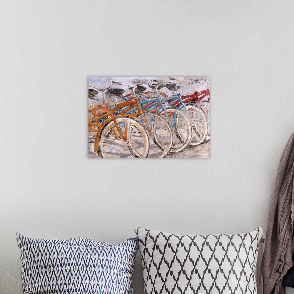 A bohemian room featuring Contemporary painting with orange, blue, and red bicycles parked in a line.