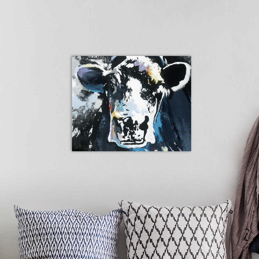 A bohemian room featuring Abstract painting of a cow with shades of blue and white and small pops of purple, yellow, and or...