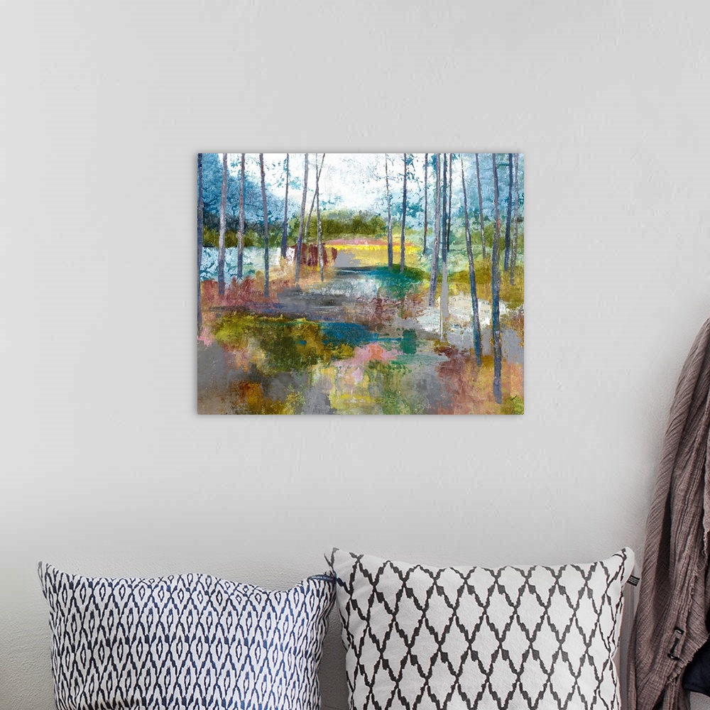 A bohemian room featuring Contemporary abstract painting of a landscape with trees and a colorful multi-colored ground.