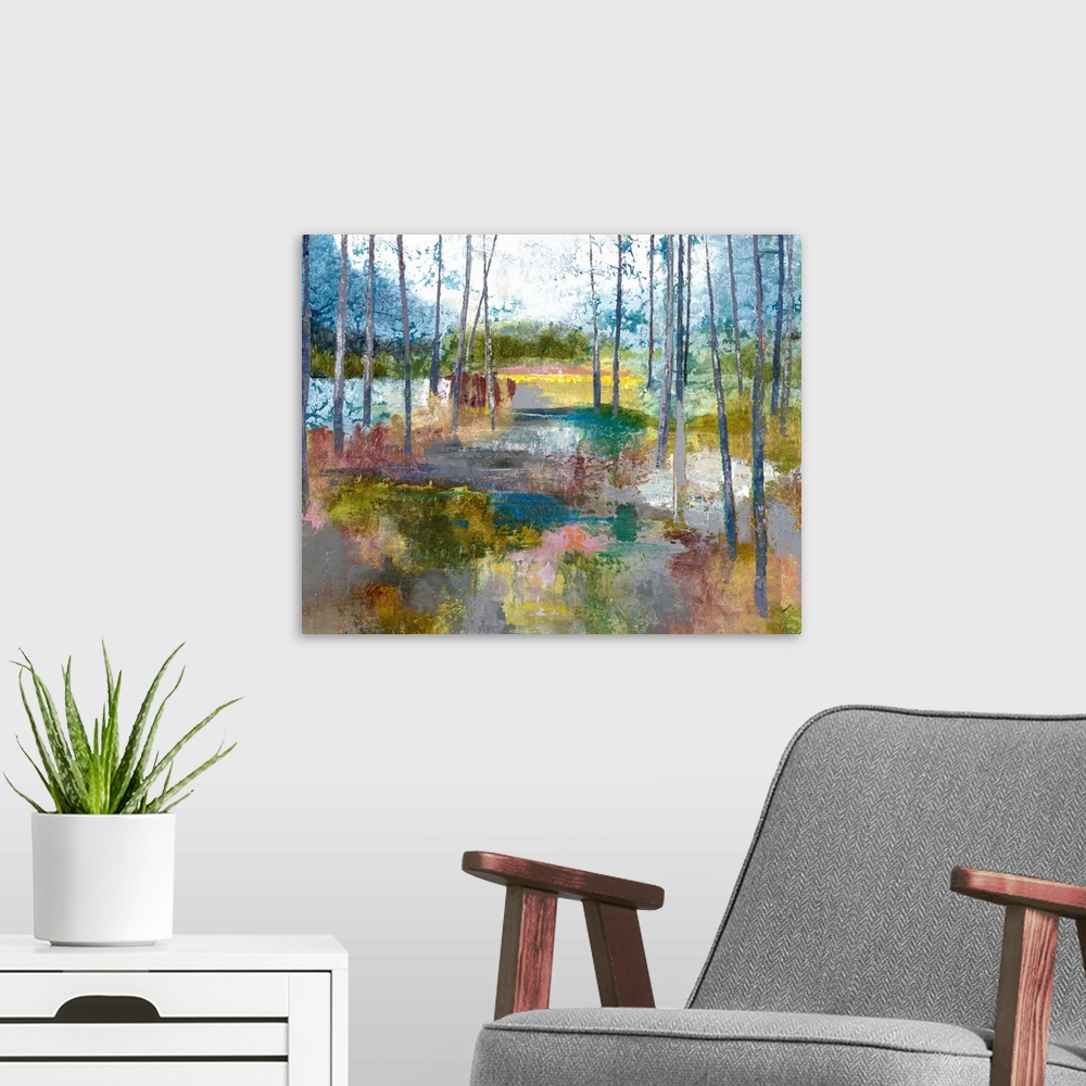 A modern room featuring Contemporary abstract painting of a landscape with trees and a colorful multi-colored ground.