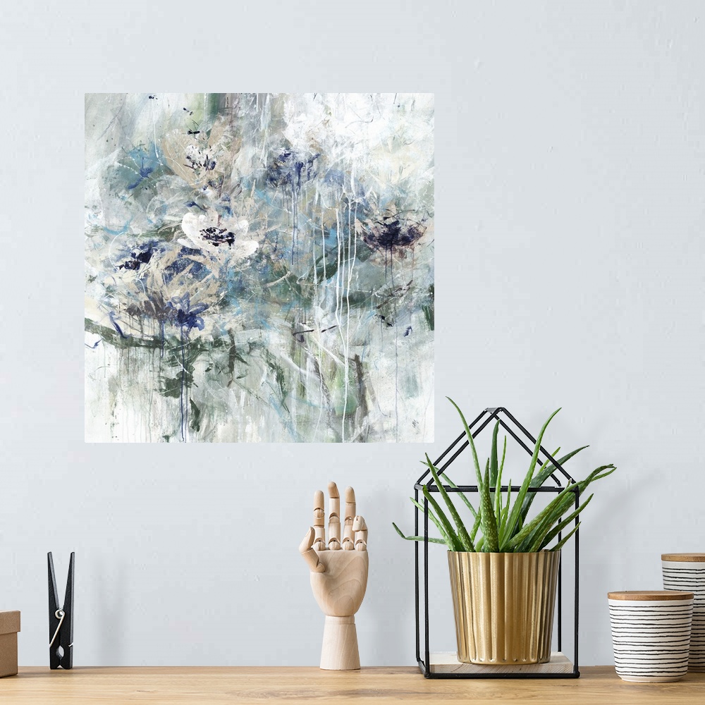 A bohemian room featuring Square abstract floral painting in shades of green, blue and white.