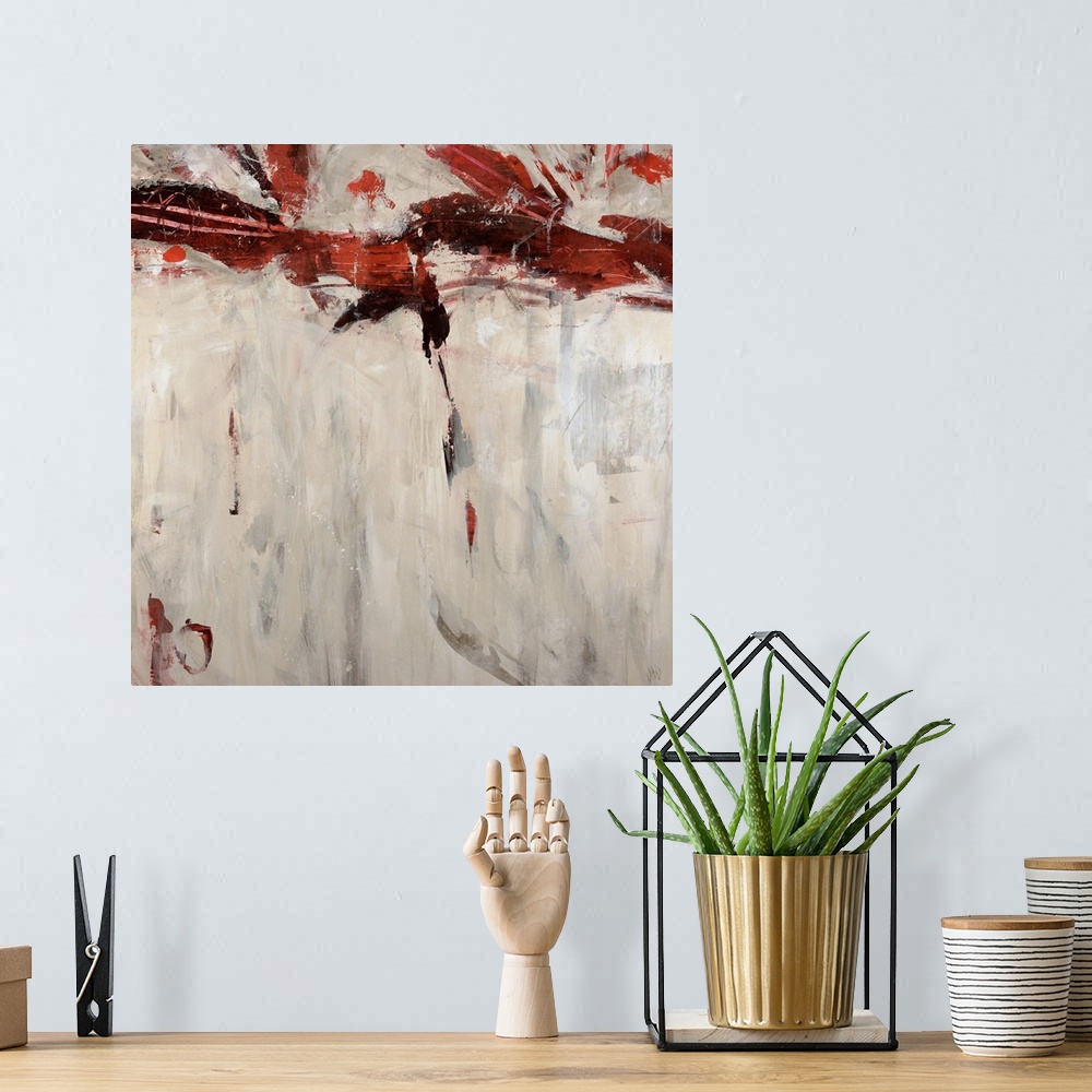 A bohemian room featuring Modern abstract painting of streaks of color on a blank background.