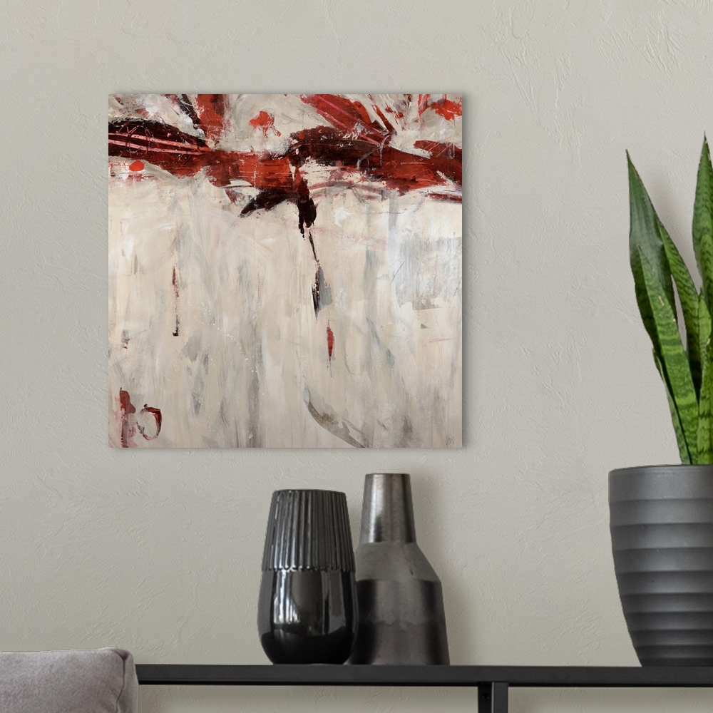 A modern room featuring Modern abstract painting of streaks of color on a blank background.