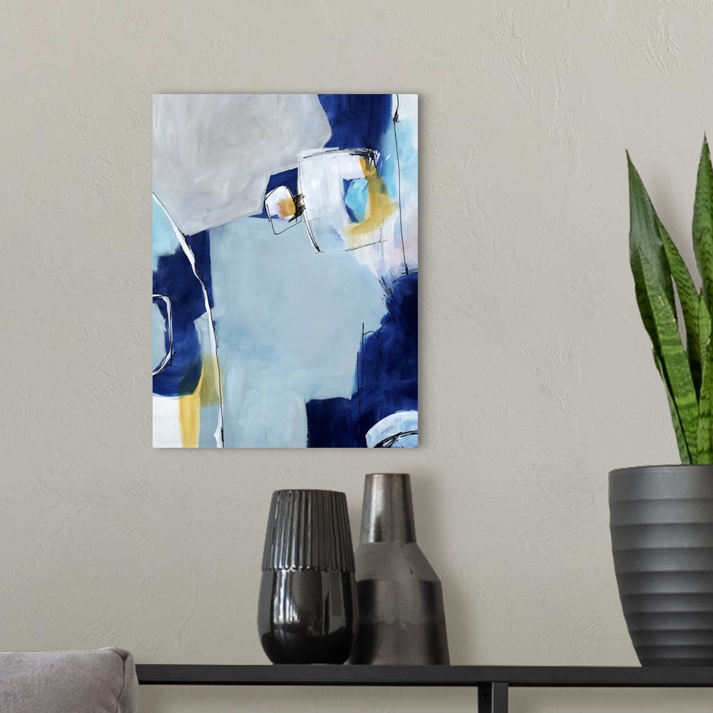 A modern room featuring Contemporary abstract painting using blue tones and thin white lines sectioning off shapes.