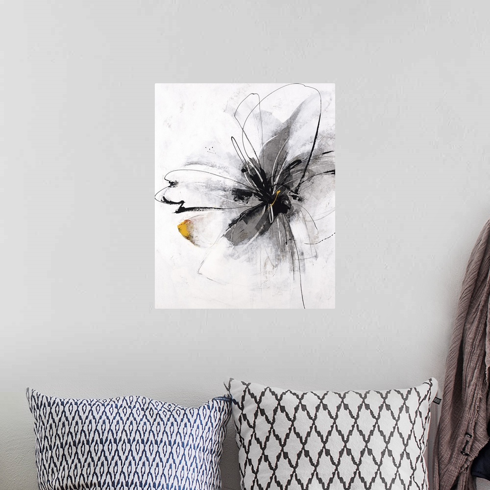 A bohemian room featuring Painting of a single flower in bloom in gray.