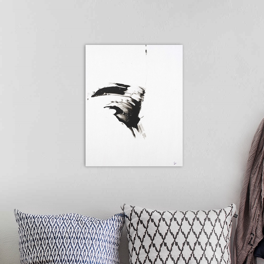 A bohemian room featuring Minimalist abstract painting with a black brushstroke in the middle of a white background.