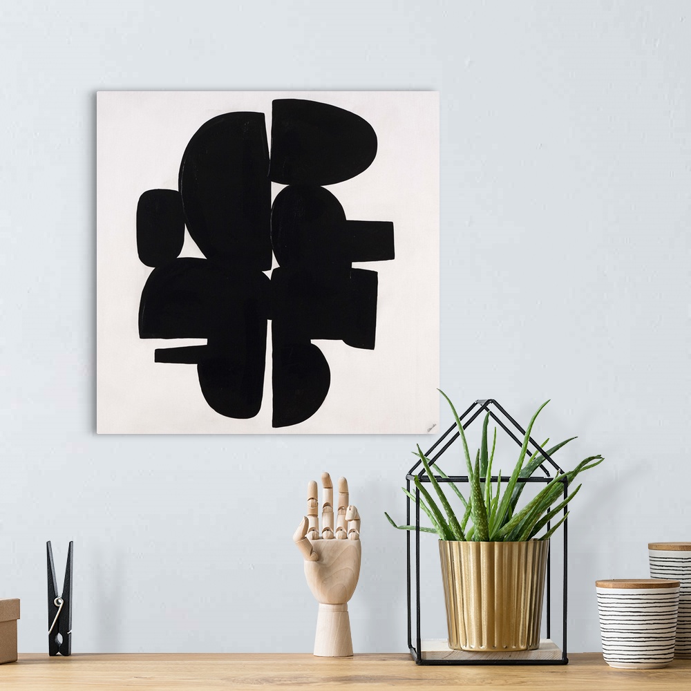 A bohemian room featuring Contemporary abstract painting of dense black organic shapes huddled together.
