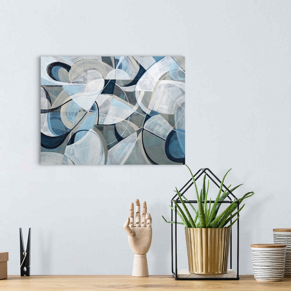 A bohemian room featuring Contemporary abstract artwork using geometric shapes in pale tone flowing against a dark gray bac...