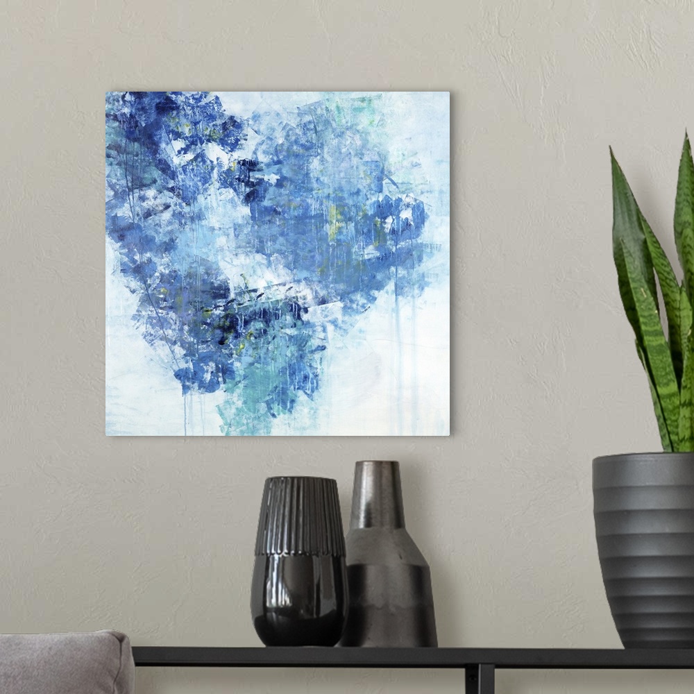 A modern room featuring Abstract painting of textured brush strokes in shades of blue in the shape of a heart.