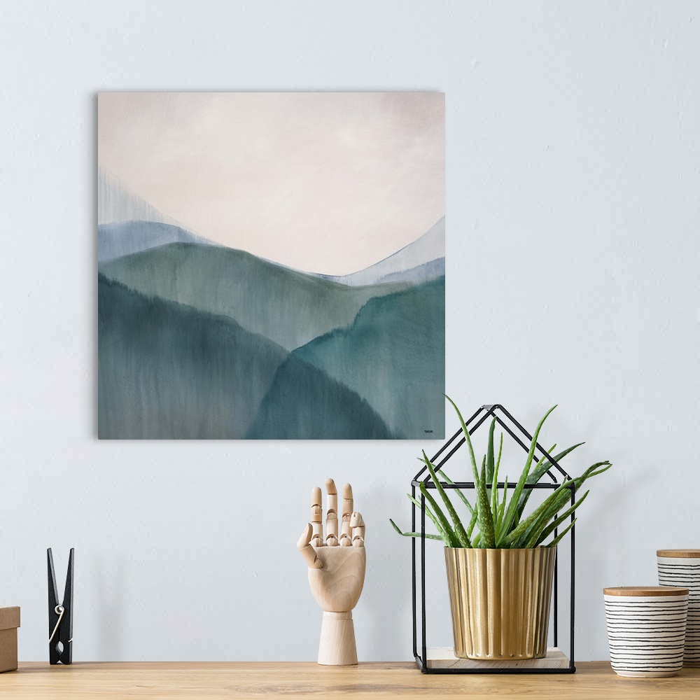 A bohemian room featuring Abstract watercolor painting of numerous hills in a valley, beneath a clear, open sky.
