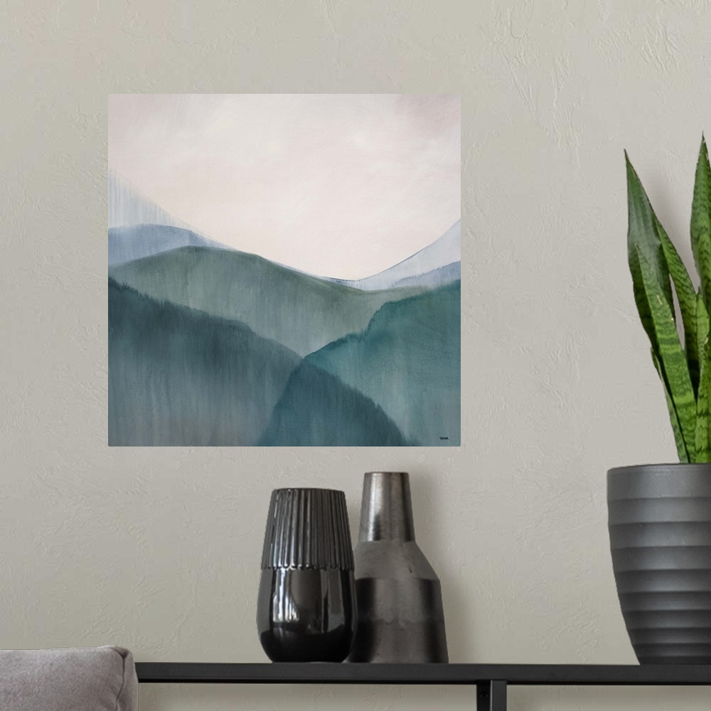 A modern room featuring Abstract watercolor painting of numerous hills in a valley, beneath a clear, open sky.
