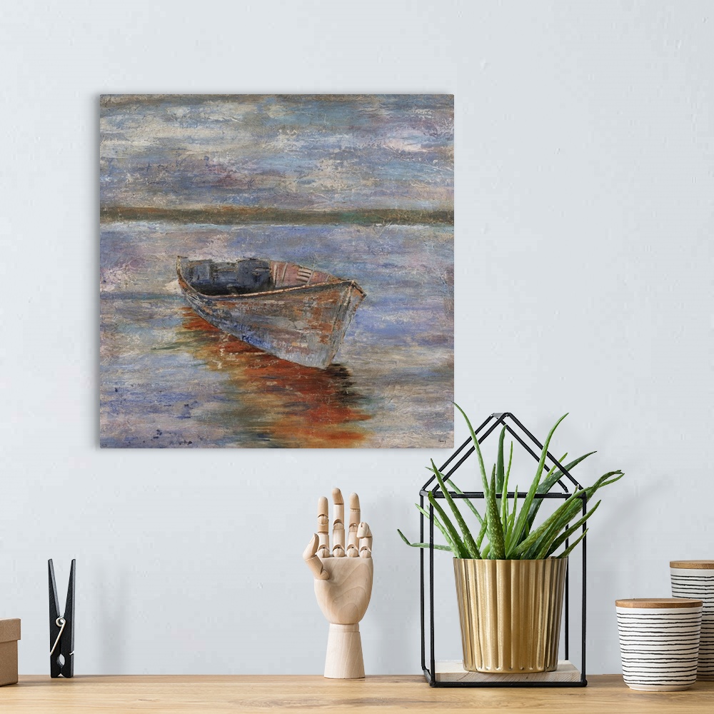 A bohemian room featuring Painting of an empty row boat sitting in calm waters at sunset, a distant mountain range can be s...