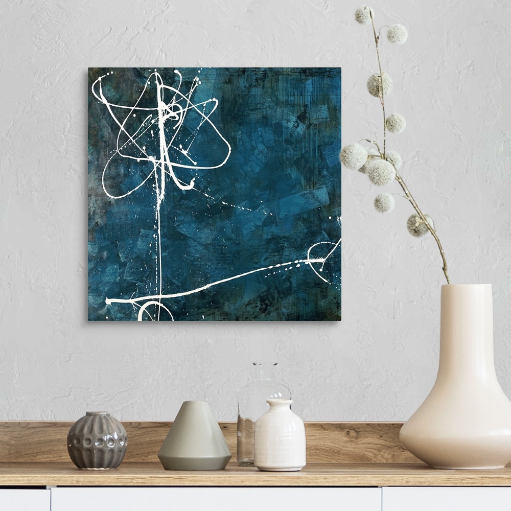 A farmhouse room featuring Contemporary abstract painting using thin white flowing lines against a dark blue background.