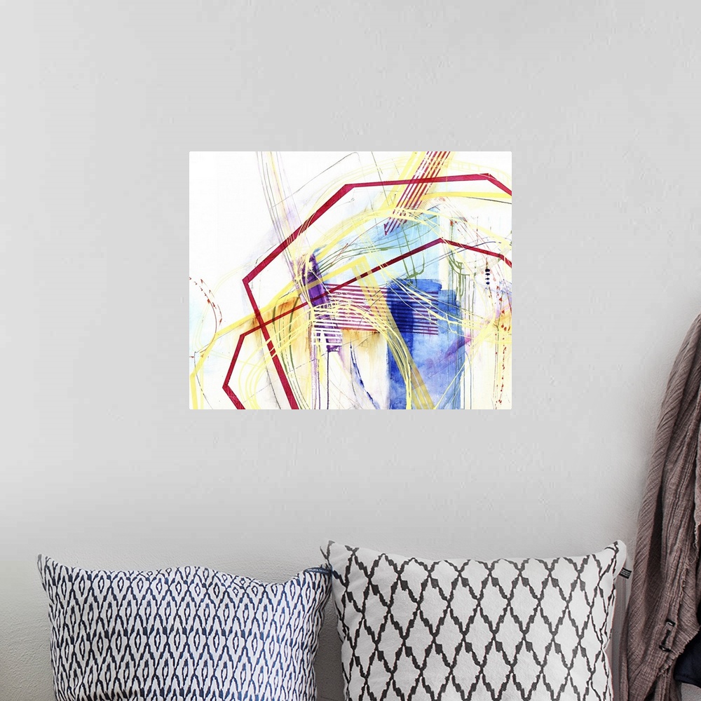 A bohemian room featuring Abstract painting with geometric shapes in red and yellow against colorful brush strokes.