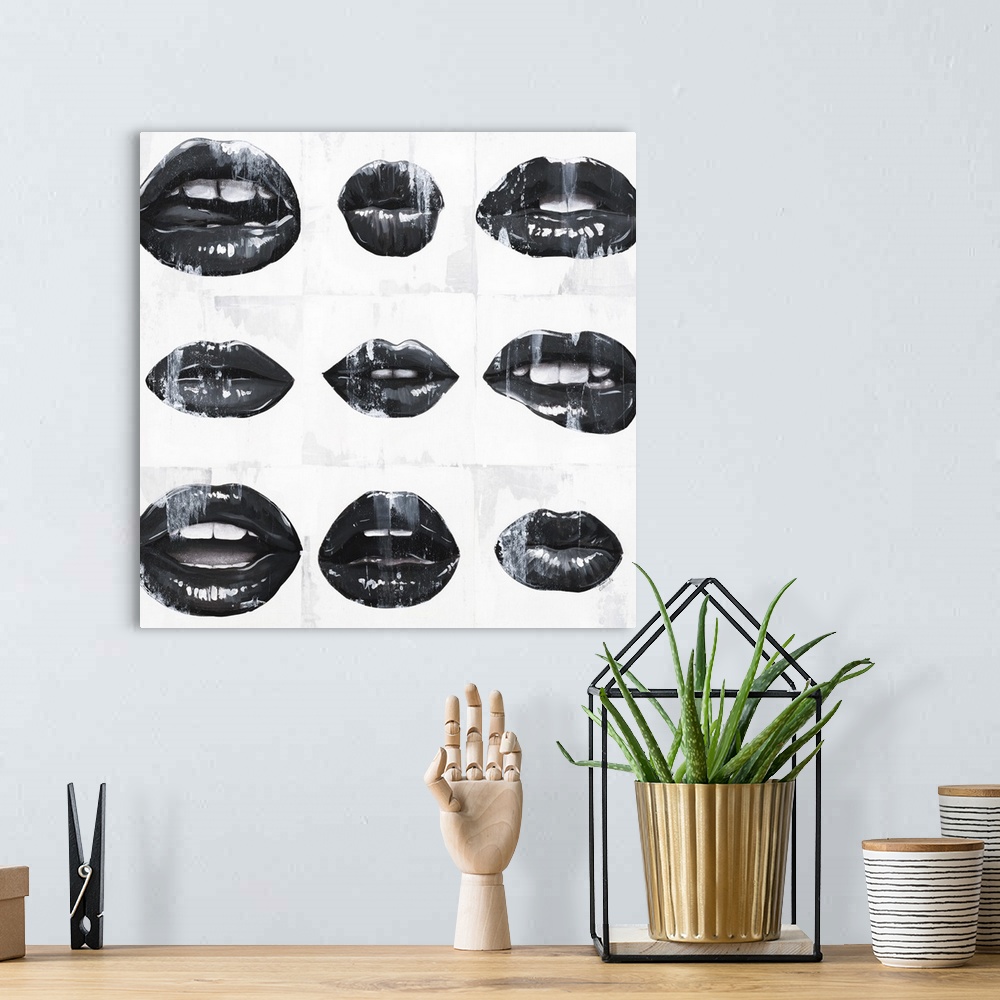 A bohemian room featuring Square art with black and white mouths open in different ways on a white background with paint drip.