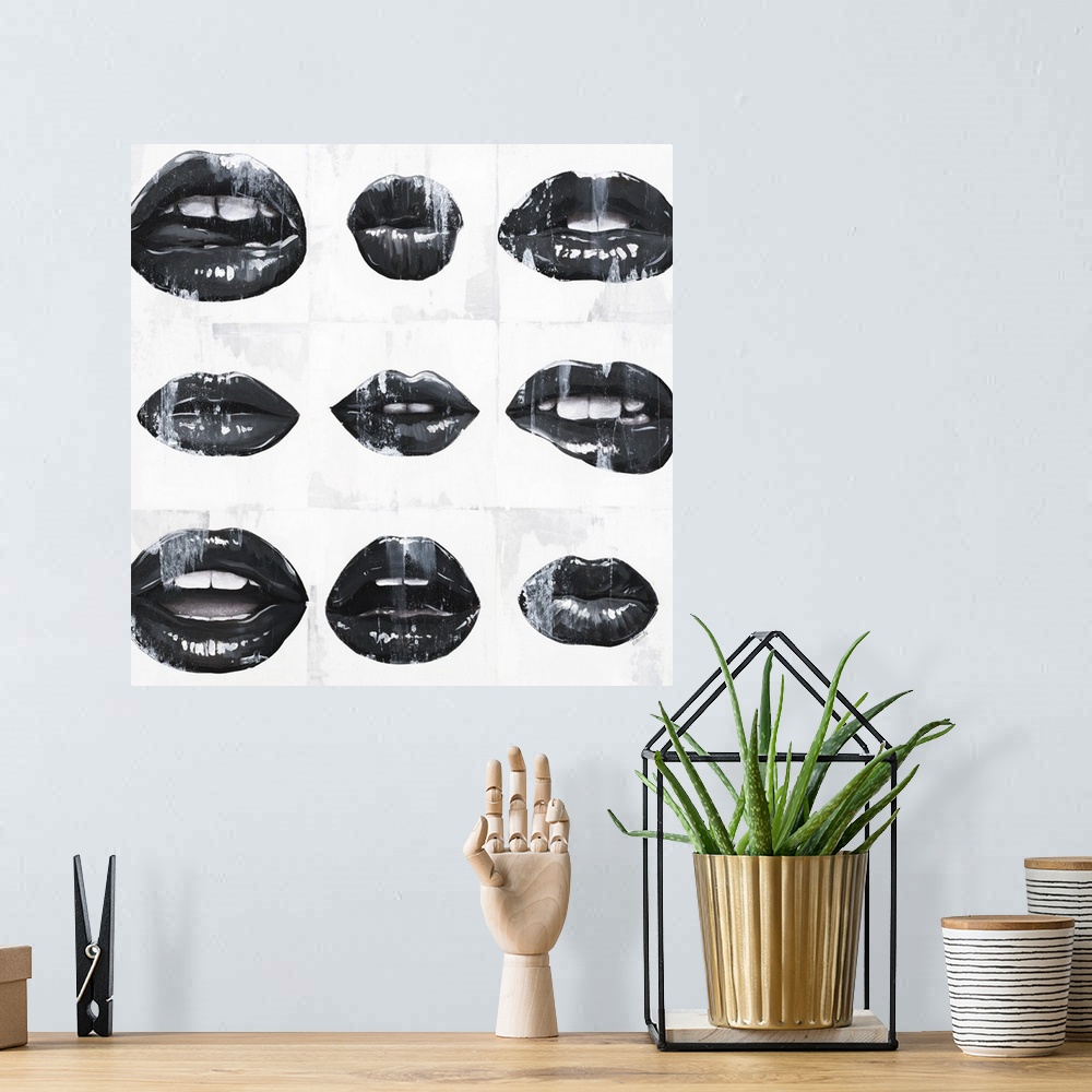 A bohemian room featuring Square art with black and white mouths open in different ways on a white background with paint drip.