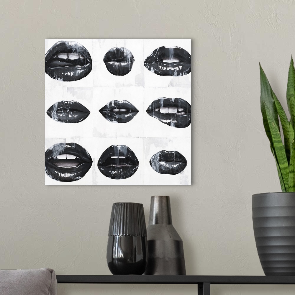 A modern room featuring Square art with black and white mouths open in different ways on a white background with paint drip.
