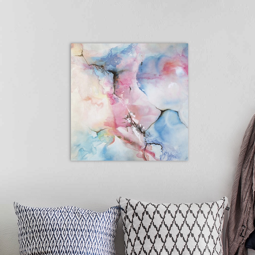 A bohemian room featuring Square contemporary abstract painting with faded blue, pink, and yellow hues that appear like a w...