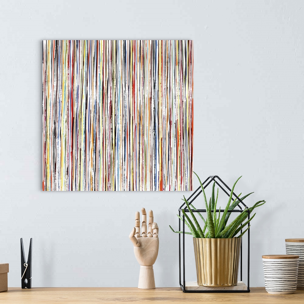 A bohemian room featuring Contemporary painting of multi- colored lines in a vertical direction.
