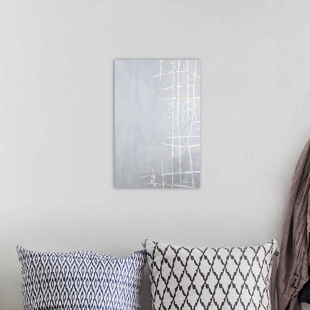 A bohemian room featuring Long vertical painting of light gray with white fine lines crossing and overlaying circles.