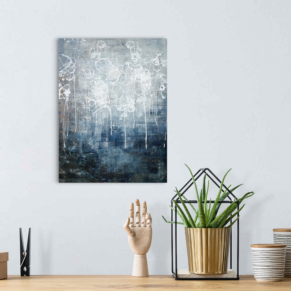 A bohemian room featuring Contemporary abstract painting using neutral tones and dark blue tones with scribbled white paint...