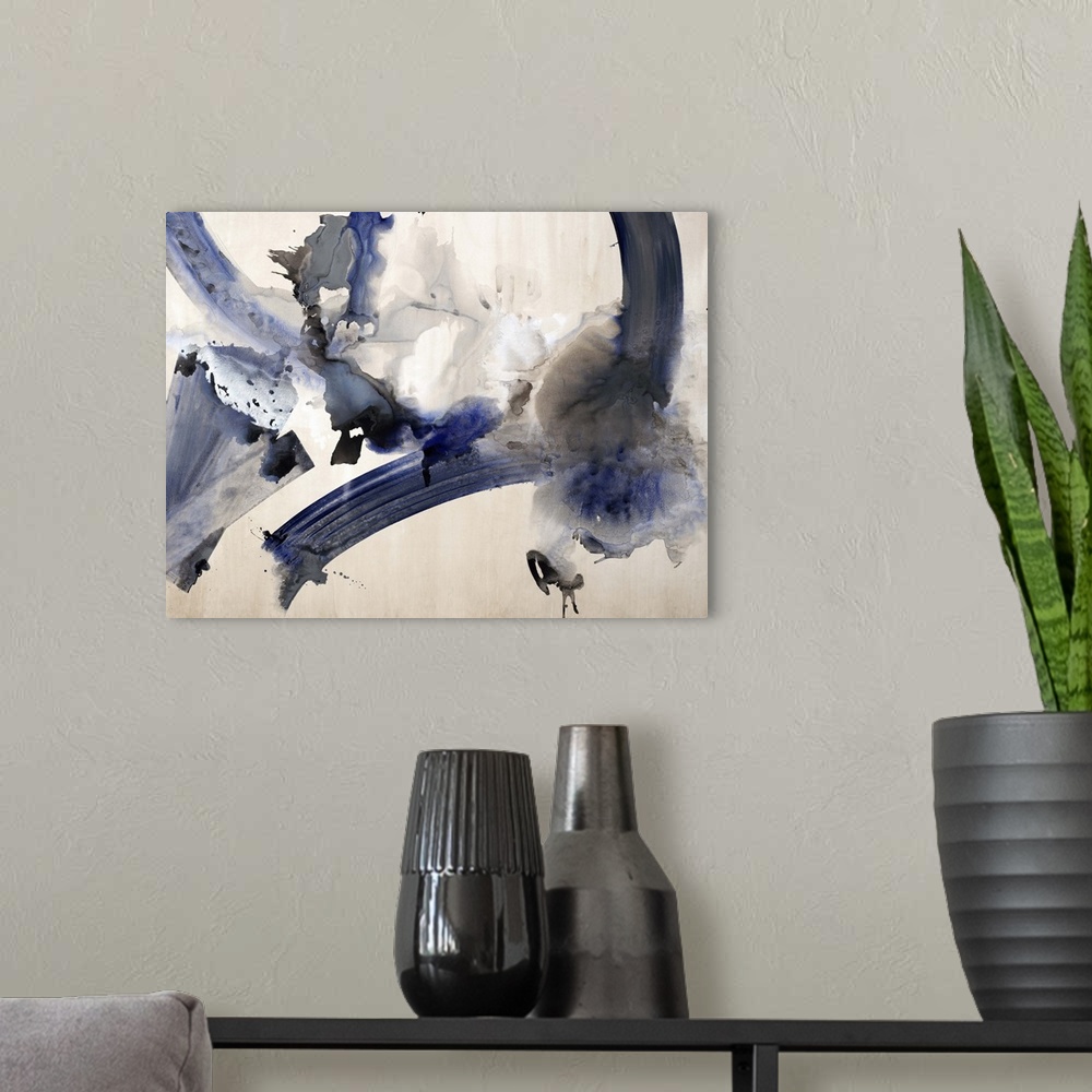 A modern room featuring Abstract watercolor painting with dark blue and black hues.