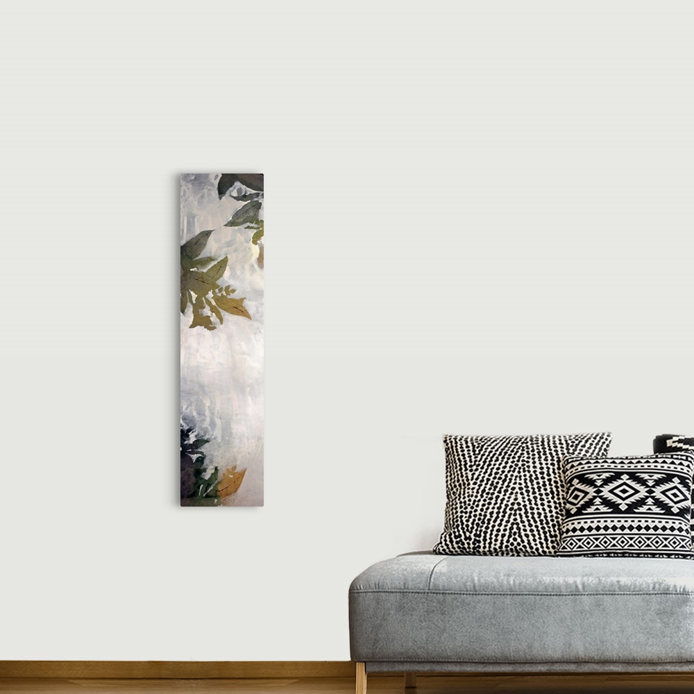 A bohemian room featuring A tall thin vertical piece that has painted leaves concentrated at the top and bottom.