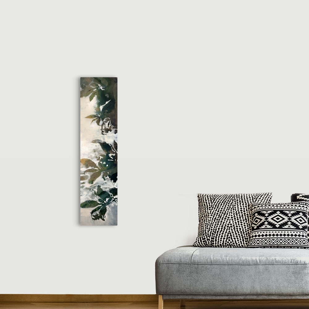 A bohemian room featuring A very tall vertical piece has drawn leaves with a layer of mist over the left side of the print.