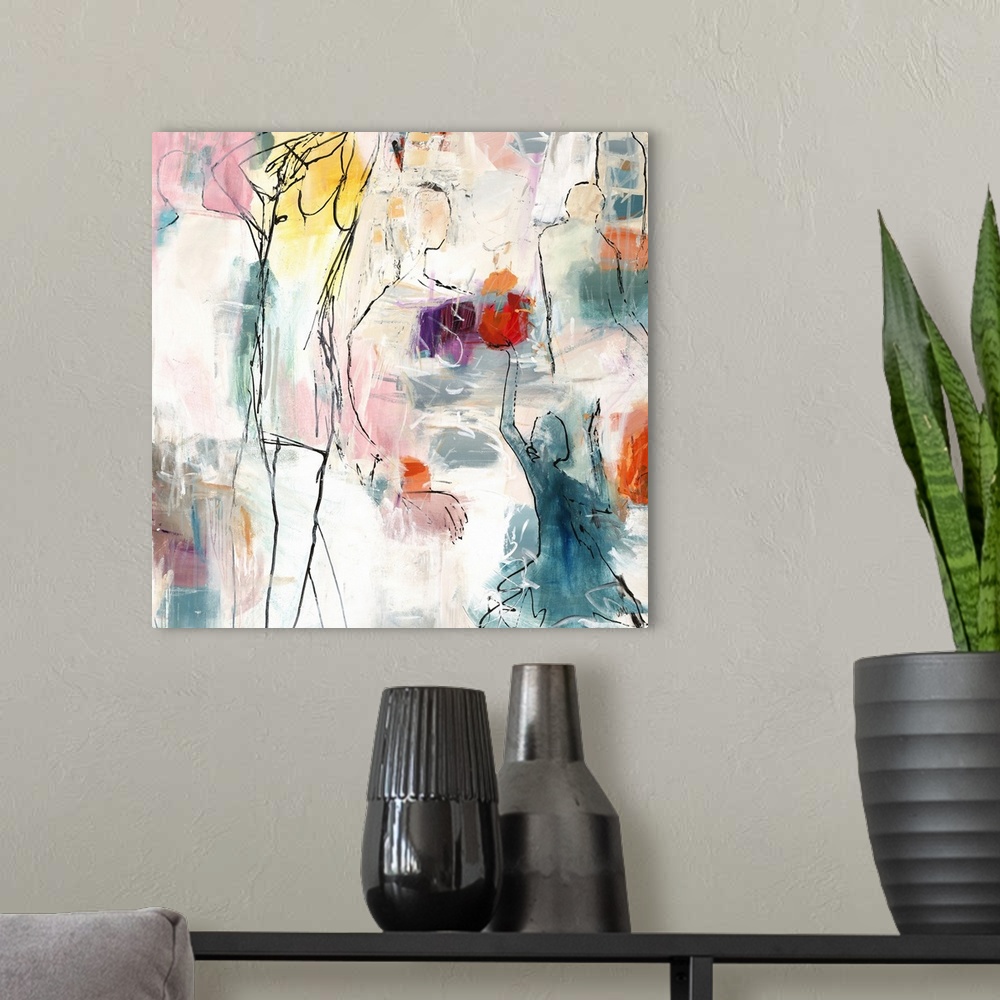 A modern room featuring Square abstract art with black outlined figures and pops of bright hues.