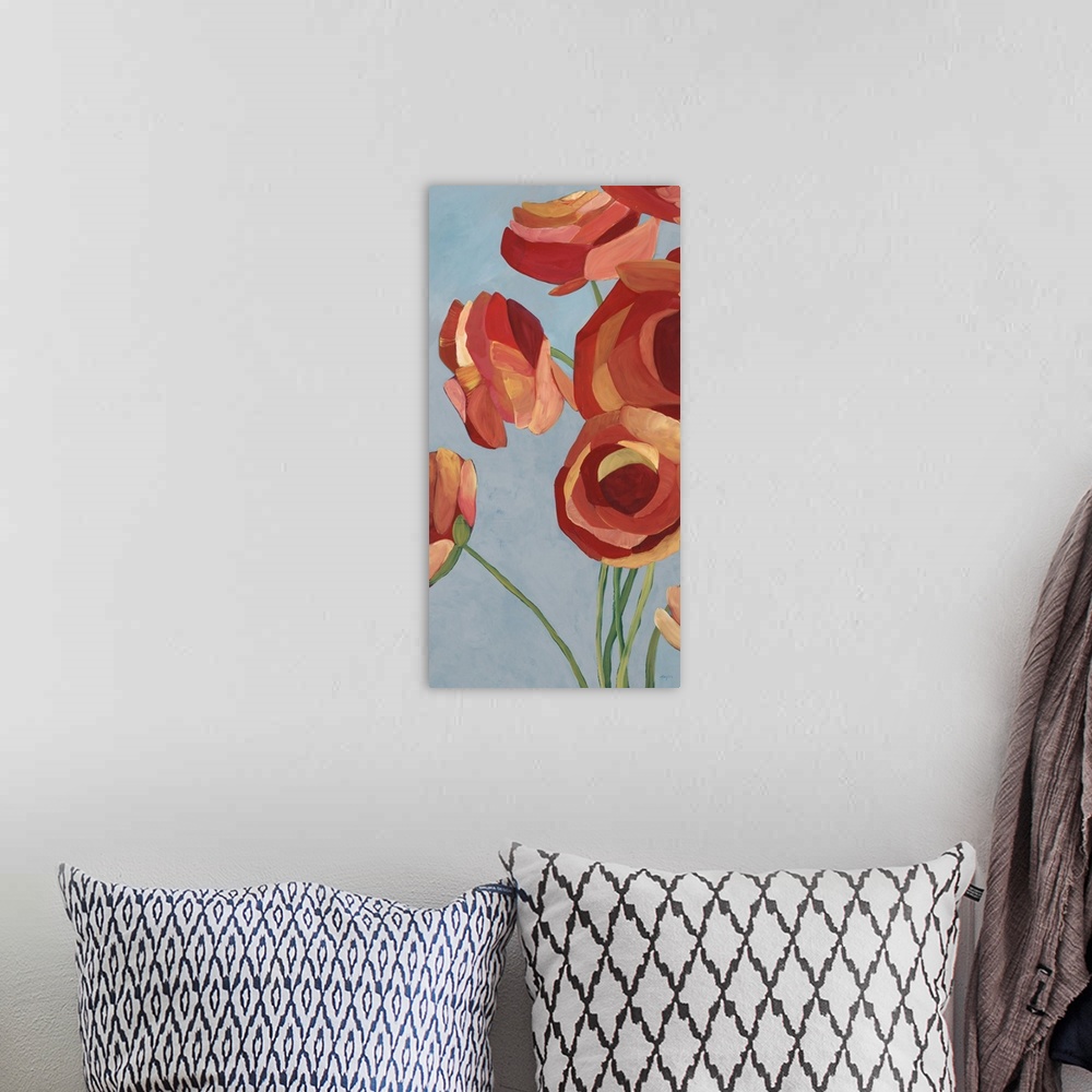 A bohemian room featuring Contemporary artwork of vibrant red flowers.