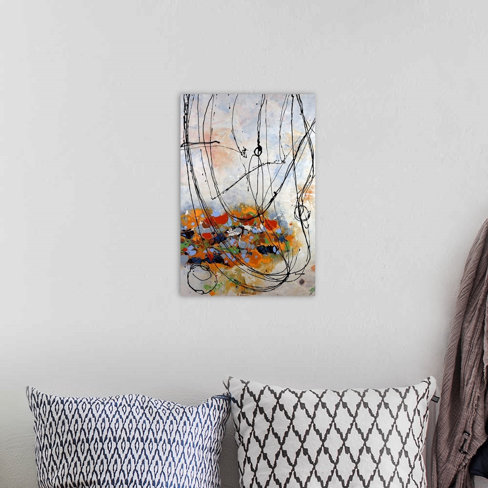 A bohemian room featuring Contemporary abstract painting with colorful overlapping paint daubs and circling ink scribbles.