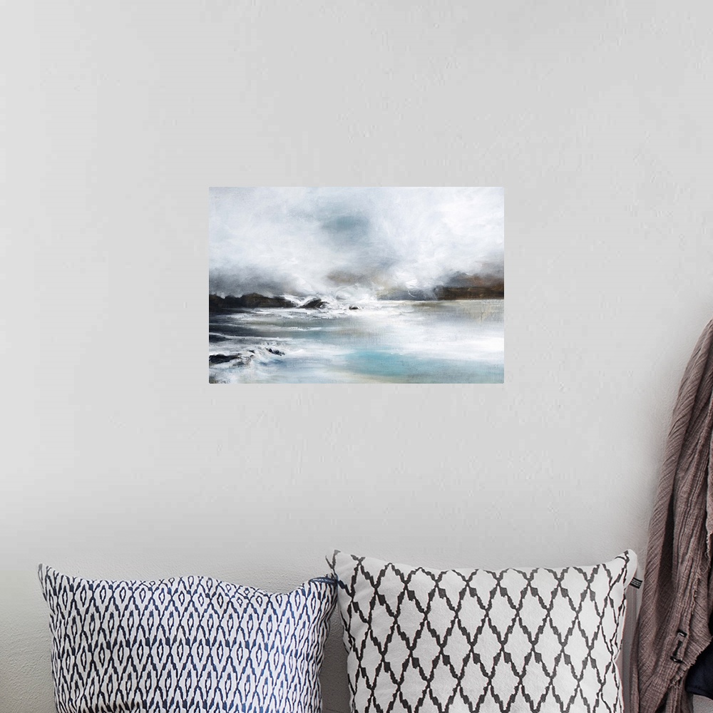 A bohemian room featuring Contemporary artwork of a seascape with mild waves on a cloudy day.