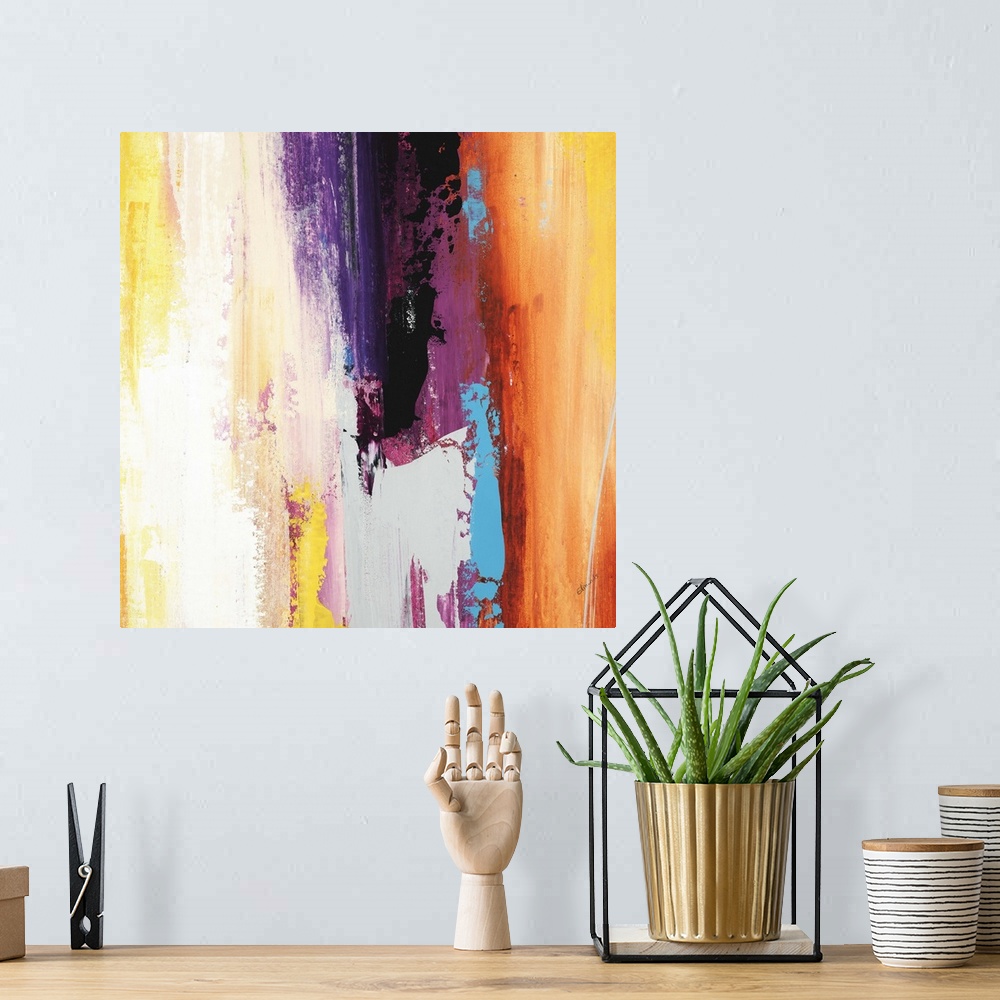 A bohemian room featuring A contemporary abstract painting using a full spectrum of colors in a vertical formation.