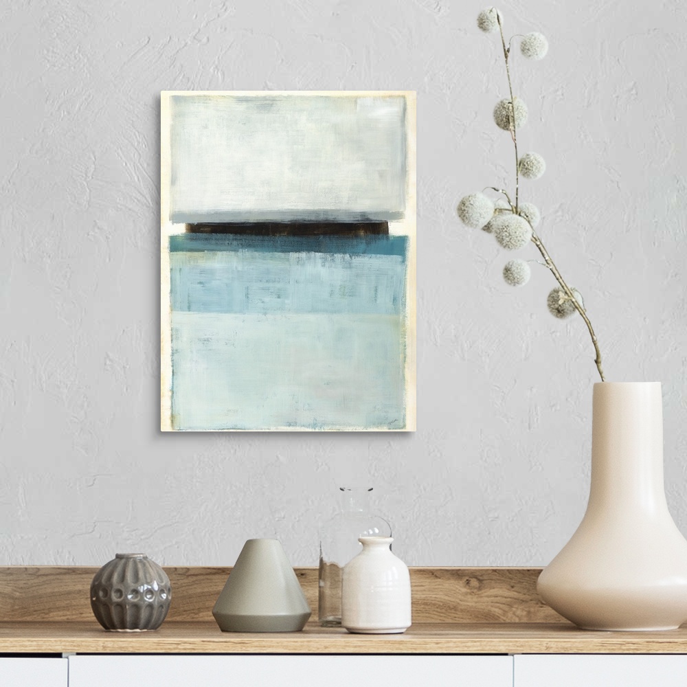 A farmhouse room featuring Large abstract painting with rectangular sections of color in shades of blue and gray with one bl...