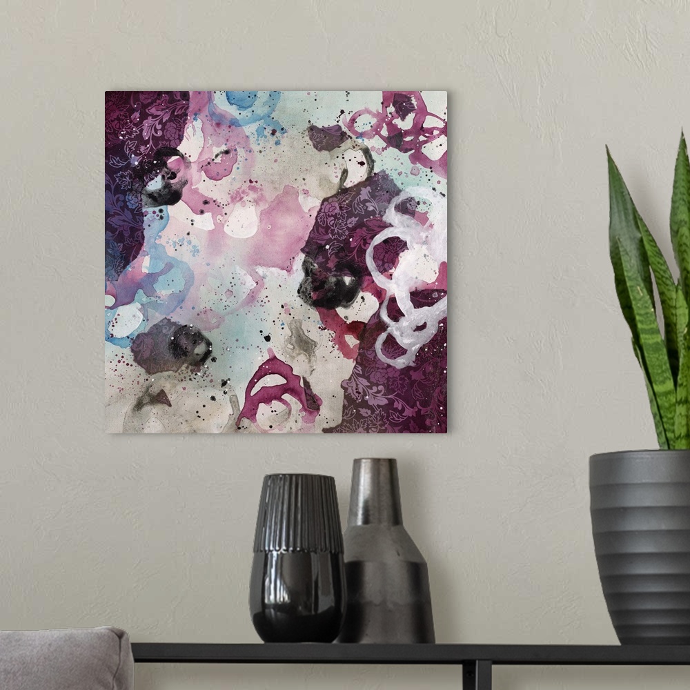 A modern room featuring Abstract painting using bright purple tones in splashes and splatters, almost looking like flowers.