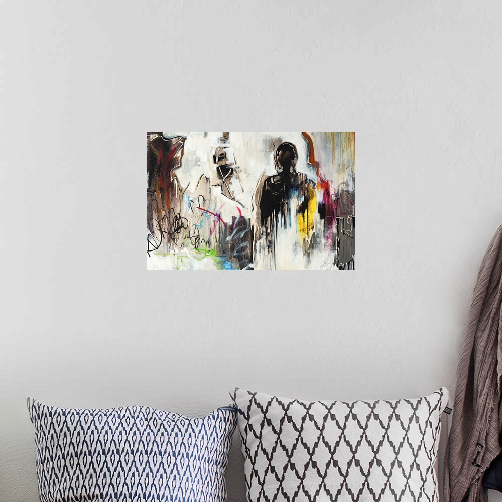 A bohemian room featuring Contemporary artwork of a group of figures with their backs turned.