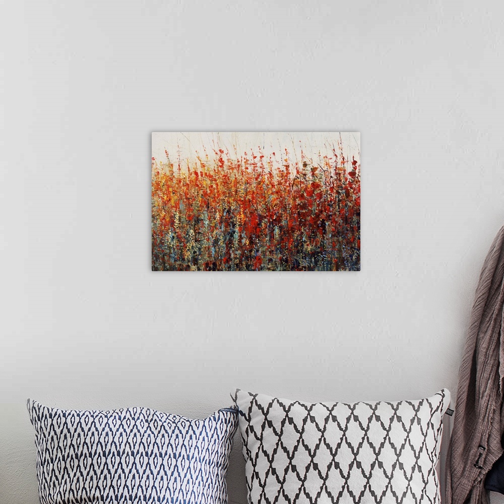 A bohemian room featuring Contemporary painting of vibrant warm toned flowers.