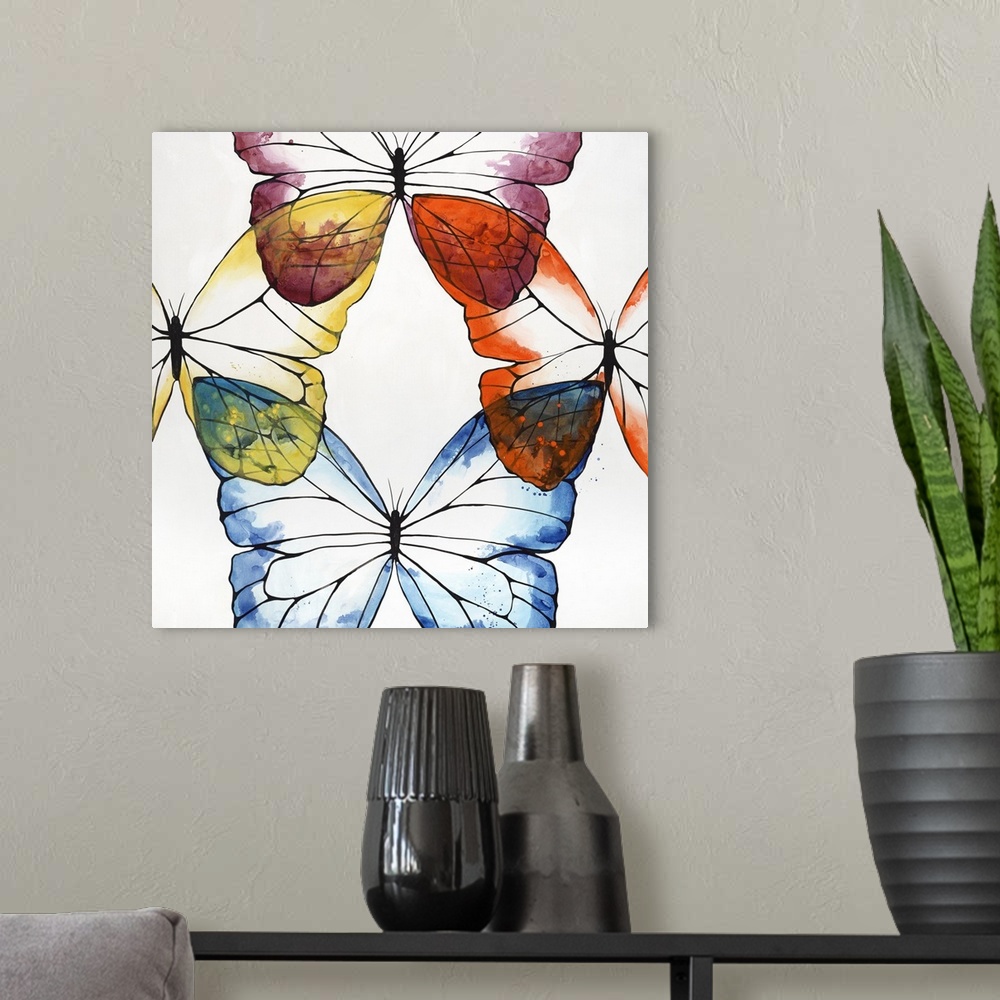 A modern room featuring Square painting of four butterflies connected by the wing on each side of the canvas with a white...
