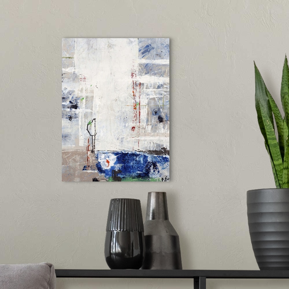 A modern room featuring Contemporary abstract painting using primary and neutral colors in weathered textures.